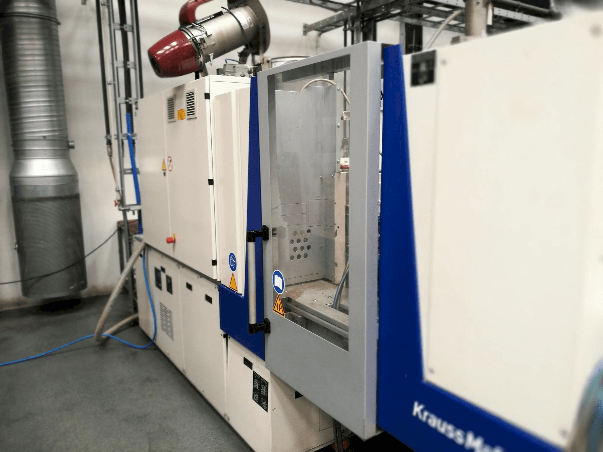 Vista frontale della macchina Krauss Maffei KM 35-55 CX