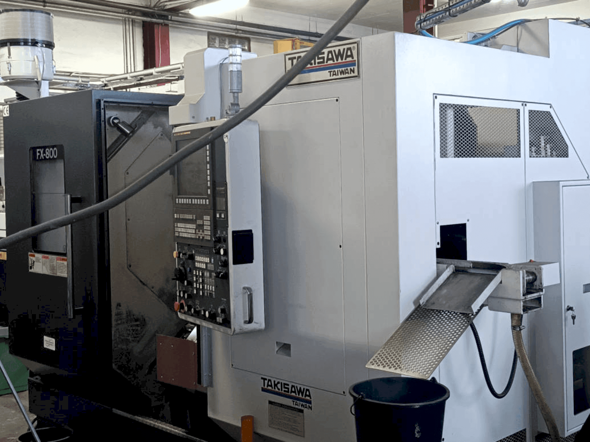 Vista frontale della macchina Takisawa FX800