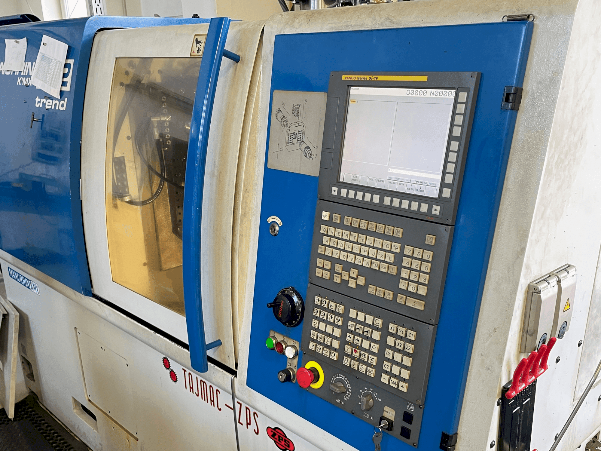 Vista frontale della macchina Manurhin K'MX 532 TREND