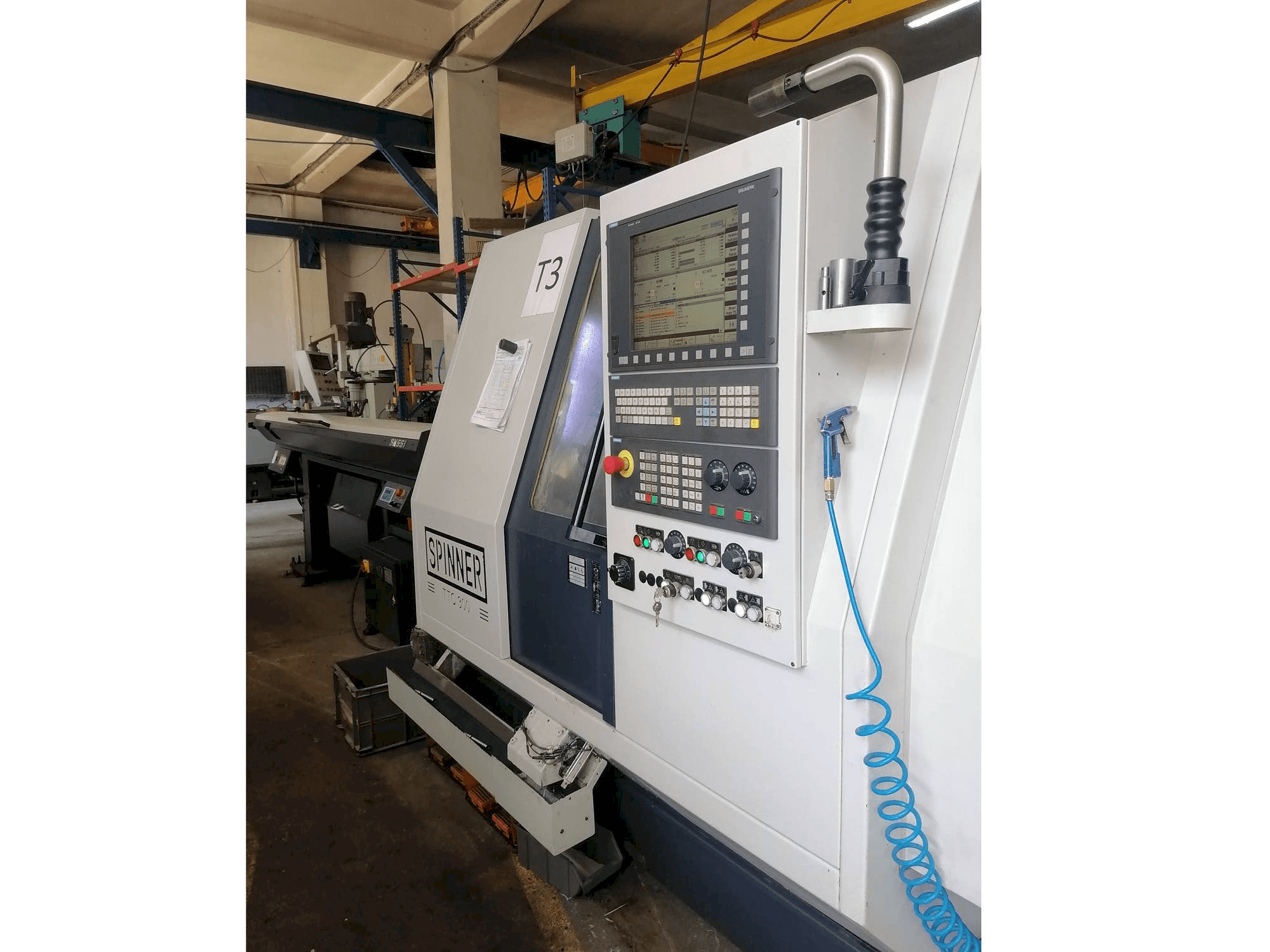 Vista frontale della macchina SPINNER TTC300-52 SMMCY