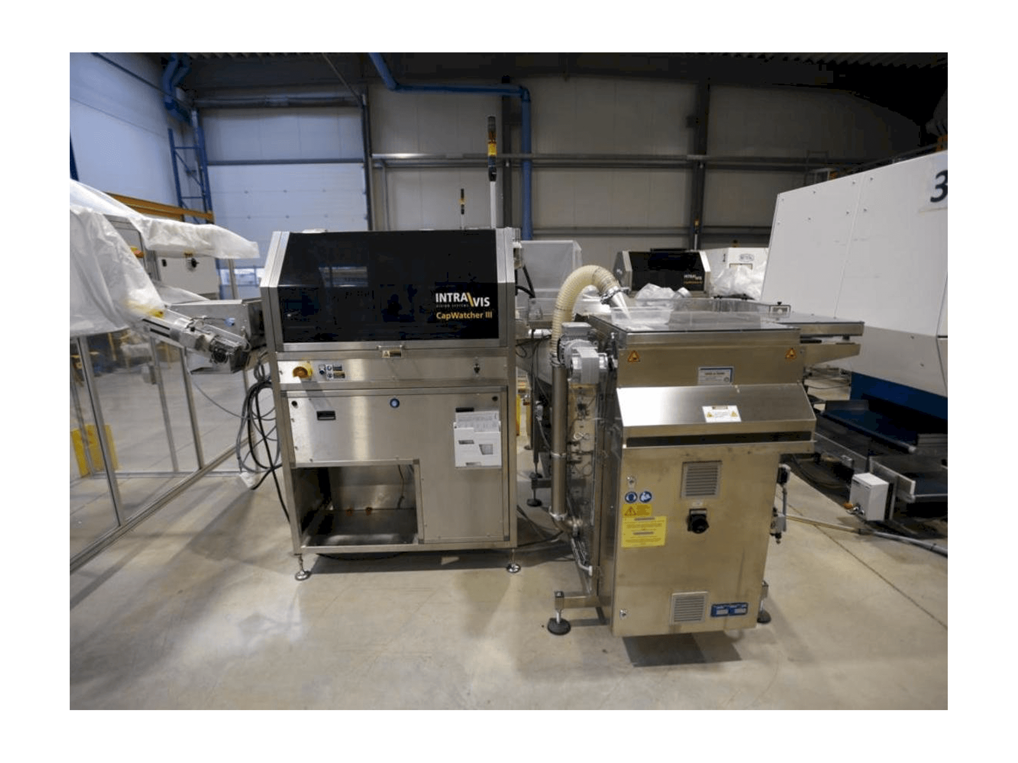 Vista frontale della macchina INTRAVIS Capwatcher 6431