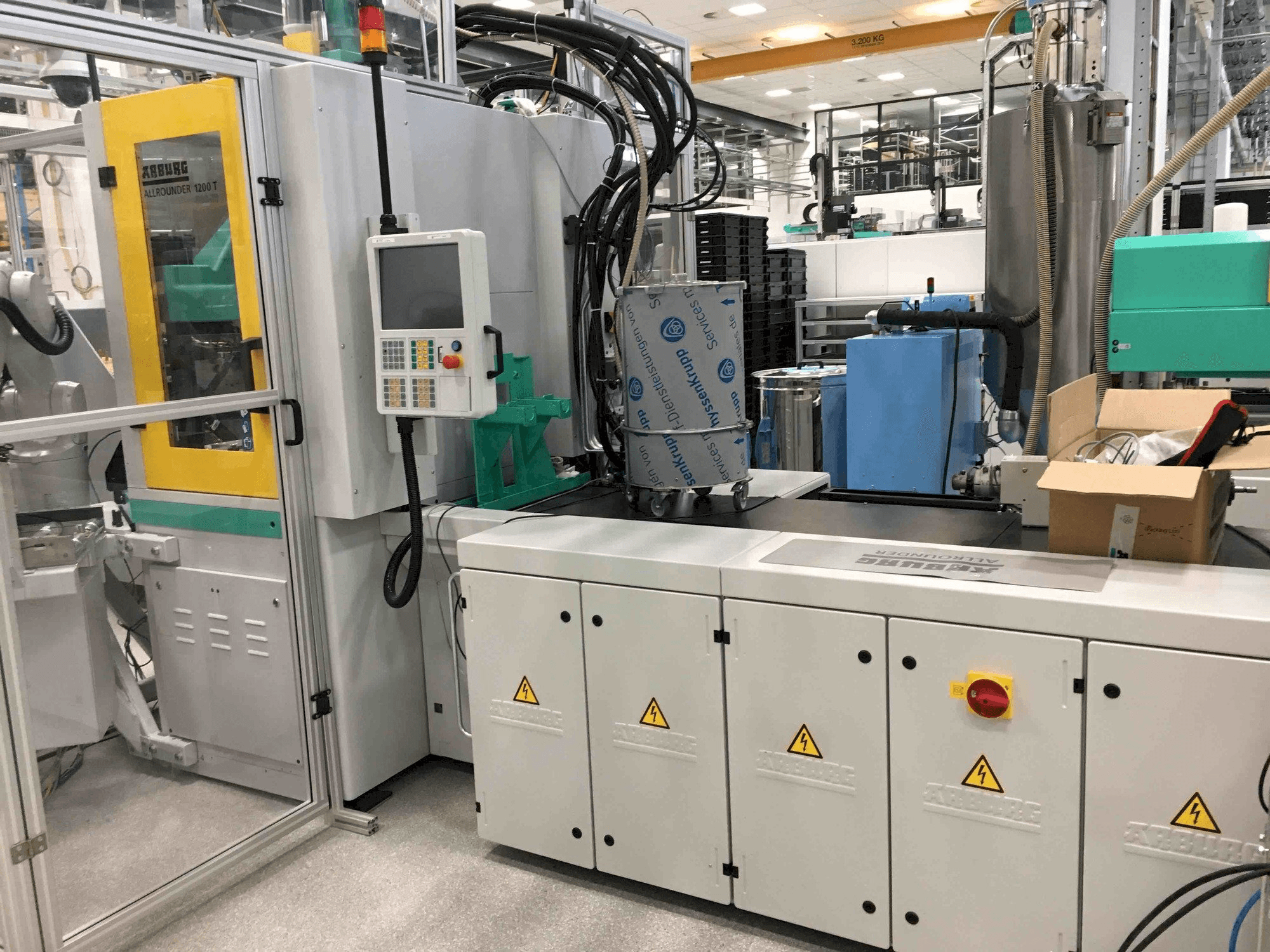 Vista frontale della macchina Arburg ALLROUNDER 1200 T 800 - 70 (2017)