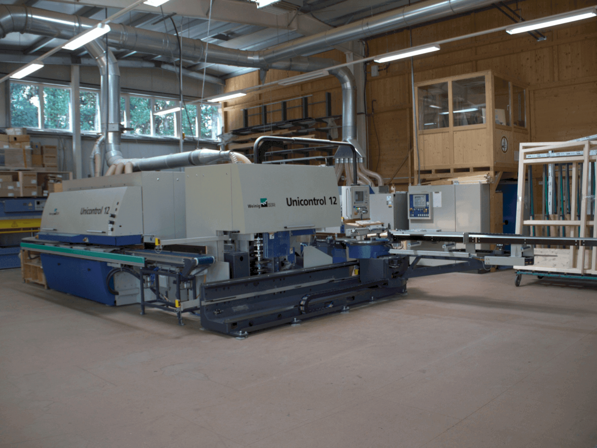 Vista frontale della macchina WEINIG / DIMTER UNICONTROL 12