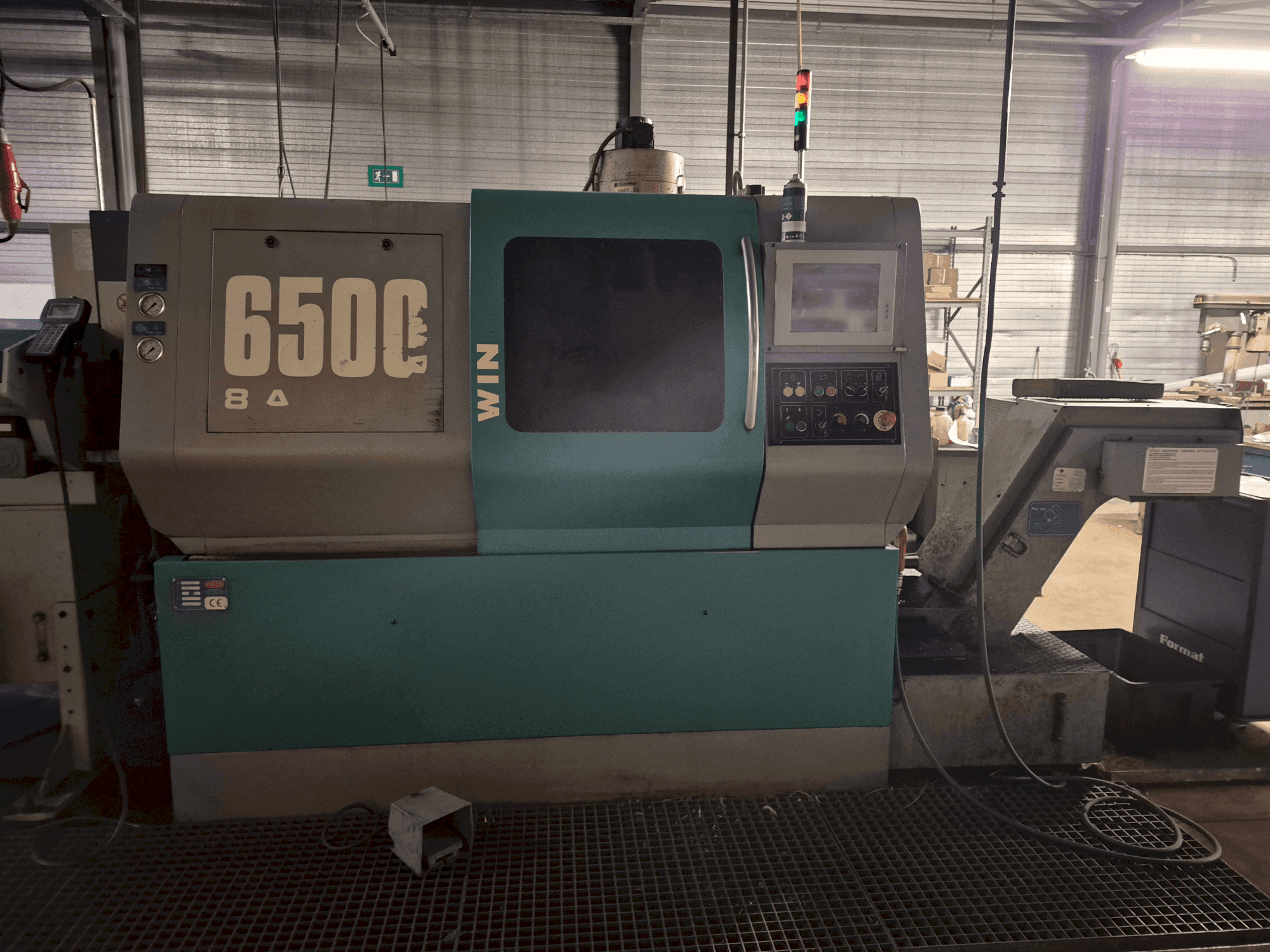 Vista frontale della macchina MUPEM WIN 6500